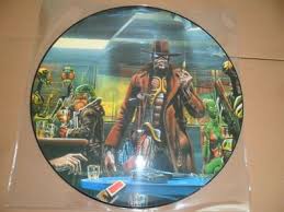 One hundred years have gone and many came they came that way to find the answer to the mystery they found his body lying where it. Gripsweat Iron Maiden Stranger In A Strange Land 12 Picture Disc 12 Emip 5589 Mint