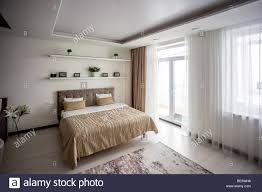 There are many ways to decorate. Bedroom Interior In Luxury Loft Attic Apartment With Roof Windows Hotel Room Vacation Concept Background Stock Photo Alamy