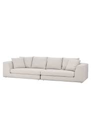Our modern and contemporary sofas come in a variety of sizes, colours and fabrics, but all of them are sumptuously comfortable and there is a style to suit every lavish living room. Ivory Sofa Eichholtz Marlon Brando 1 Eichholtz Retailer Oroa
