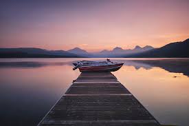 Wooden Pier And Boat At Dawn, Lake Mcdonald, Glacier National Park,  Montana, Usa Digital Art by Seth K. Hughes