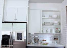 A kitchen soffit is usually a boxy structure built to hide wiring, pipes, or other mechanicals, or to fill the space between the top of your cabinets and the ceiling. Filling In That Space Above The Kitchen Cabinets