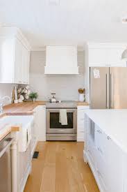 Caulk around the seams between the vent hood and the ceiling. Our Farmhouse Kitchen Renovation Taking You Inside Our New Farmhouse Style Kitchen Making It In The Mountains