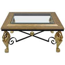 Metal base tables for the dining room and living room. Regency Style Swan Base Rectangular Coffee Table Gold Metal Iron And Glass Top For Sale At 1stdibs