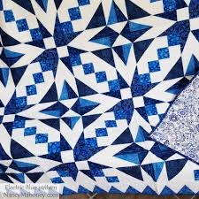 Blue-and-white is a timeless color scheme! I made 'Electric Blue' using  Tri-Rec rulers to make short work of the cutting. The two different blocks  create a terrific secondary design. ❤️✂️❤️