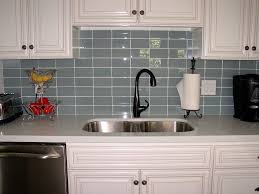 Gray and white kitchen design with shaker cabinets, gray glass subway tile backsplash, gray glass herringbone tile accent, custom white barrel range hood, thermador range, cambria quartz countertop, serena and lily riviera counter stools, under cabinet lighting, interior cabinet lighting, large island with prep sink, integrated plate rack, farmhouse sink, custom panel refrigerator and freezer. Blue Glass Subway Tile Kitchen Backsplash Blue Glass Subway Tile Backsplash Page 4 Line 17qq Com We Ll Show You The Easiest Process For Installing A Backsplash With Aspect Tile