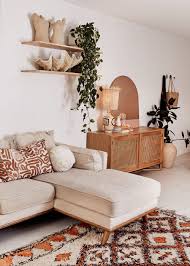 Think warmer colour palettes with green, earthy tones, layered natural materials and. Tour The Bohemian Home Of Vintage Curator Yvonne Starr Earthy Living Room Earthy Home Decor Boho Living Room