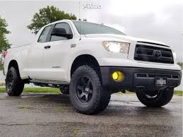 The 2010 tundra models feature a new grille design and redesigned taillights. 2010 Toyota Tundra Wheel Offset Aggressive 1 Outside Fender Suspension Lift 3 5 807686 Trailbuilt Off Road