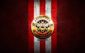 Fc brentford | фк брентфорд. Download Wallpapers Brentford Fc Golden Logo Efl Championship Red Metal Background Football Fc Brentford English Football Club Brentford Fc Logo Soccer England For Desktop With Resolution 2880x1800 High Quality Hd Pictures Wallpapers