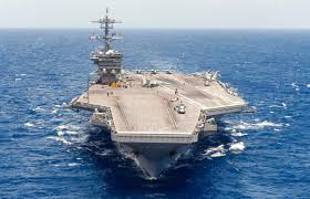 Twenty Sailors Aboard The Aircraft Carrier Uss Theodore Roosevelt Cvn 71 Donned The Khaki Uniform For T Navy Carriers Aircraft Carrier Uss Theodore Roosevelt