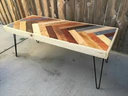 These pallets coffee tables are very cute if designed a well manner, you can make indoor or outdoor pallets coffee tables with different patterns. Colorful Pallet Chevron Pattern Coffee Table Pallet Furniture Plans