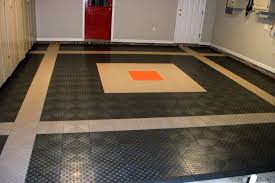 These coin pattern tiles can be found used successfully on garage floors, on auto show and car dealership show room floors, in commercial and residential garages, as designer retail display flooring, and any other place where a modular floor tile system that is slip resistant, customizable, and extremely durable would be beneficial. Diamond Grid Loc Tiles Snap Together Garage Floor Tiles Rubber Garage Flooring Garage Floor Garage Floor Tiles