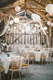 A Relaxed And Rustic Vintage Travel Insipired Barn Wedding Vintage Wedding Reception Rustic Wedding Decor Rustic Wedding
