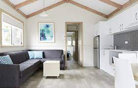 Whether you're traveling with friends, family, or even pets, vrbo holiday homes have the best amenities for hanging out with the people that matter most, including pool and private pool. Ocean Breeze Cabins Lounge Kitchen Dining Open Plan Picture Of Nrma Port Macquarie Breakwall Holiday Park Tripadvisor