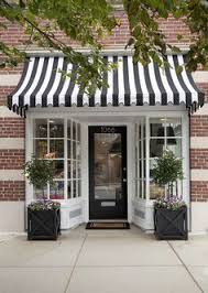 Black And White Awning Convert Garage Into A Shop Google Search Shop Front Design Store Fronts Cafe Design