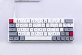 There are no f row keys, no arrow cluster. 60 Mechanical Keyboard Zeus