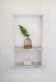 Call it the excessive cleavage of the bathroom. It Doesn T Need To Be Exactly The Same As The Metro Restroom You Can Simply Utilize The Floor Tile Des Tile Shower Niche White Subway Tile Shower Shower Niche