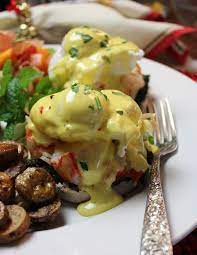 Lobster Eggs Benedict With Wilted Spinach Truffle Hollandaise Breakfast Brunch Recipes Eggs Benedict Recipes