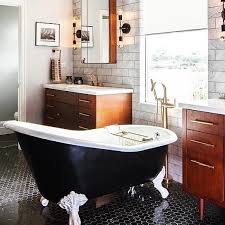 The modern clawfoot bathtubs are also made using the same material for authenticity but can also be acrylic in case of weight limitations. Clawfoot Tub Meets Mid Century Modern Vanities Trinsic Tub Filler And Vero Faucet Featured Design And Photo B Modern Tub Clawfoot Tub Mid Century Modern Vanity