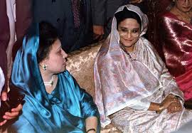 Prime Minister Sheikh Hasina (R) and opposition leader Begum Khaleda Zia (L) sits at a wedding reception for Khaleda's second son's Arafat Rahman Koko. Dhaka, March 29, (1997) Photographer- Rafiqur Rahman.