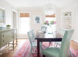 Decorate your dining room with a simple, rustic wood table and contrasting wooden chairs. 40 Dining Room Decorating Ideas Bob Vila