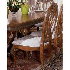 In modern times it is usually adjacent to the kitchen for convenience in serving, although in medieval times it was often on an entirely different floor level. 60033 23 Aico Furniture Side Chair With Fabric Back Amaretto