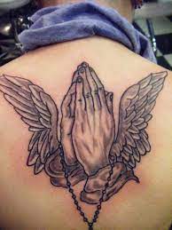 30 Awesome Tattoos About Hand Cuded Praying Hands Tattoo Design Praying Hands Tattoo Hand Tattoos