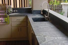 Similar to marble and granite, black soapstone countertops have a glossy and vibrant black tone with uneven veining of white to light gray color. Best Outdoor Kitchen Countertops Compared Countertop Specialty