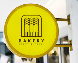 Download Free Psd Bakery Store S Yellow Shop Sign Mockup PSD Mockup Templates