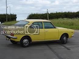 Image result for Herald Yellow 1974 Subaru