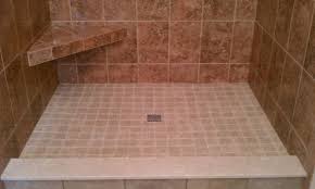 When you pack the deck mud in your shower floor you will be able to rake it into the shape you want by using short pieces of wood as straightedges. Custom Tile Shower Pans Tile Company Rochester Ny Deangelis Tile