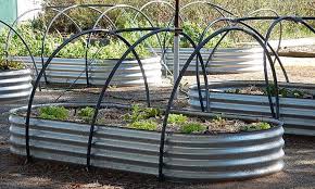 Use pvc pipes to create a living canopy. Raised Bed Hoop House For Your Raised Bed Epic Gardening