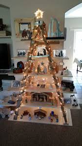 Nativity Collection On Shelves Made From An Old Ladder Nativity Set Christmas Decorations Christmas Crafts