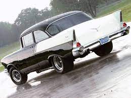 This malaysia made gasser has a metal body with a plastic base, interior, and windows. 1957 Chevrolet Black Widow The Black And White Fuel Injected 150 Two Door Sedans Appeared At Nascar S National Speed Wee Classic Cars Muscle Chevy Dream Cars