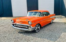 Image result for Orange Red 1957 Motorcycle