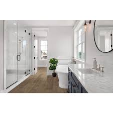 As your trusted bathroom contractors, we apply our experiences and skills we acquired from our years behind providing bathroom refinishing and renovation to the community. Sure Fawn Brown Birch 6 5mm T X 6 5in W X 48in Varied L Waterproof Engineered Click Hardwood Flooring 21 67 Sq Ft Case 13r6sbi6b044wg3 The Home Depot Modern Bathroom Remodel Bathroom Remodel Cost Bathroom