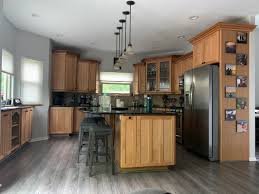 However, don't simply brush stain over the pickled surface. Evergreen Modern Before And After Colorado Cabinet Cladding Professional Kitchen Cabinet Painting