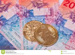 Bitcoin Crypto Currency Coin Over Swiss Francs Bank Notes