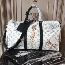 Black And White Louis Vuitton Duffle Bag Louis Vuitton M41449 Keepall 45 Bandouliere Duffel Bag Monogram Coated Canvas Louis Vuitton Monogram Bag Louis Vuitton Handbags Louis Vuitton Mens Bag