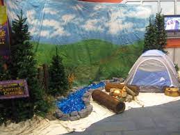 The campfire scene has light bulbs, a blower, and silk fabric to create realistic flames in a campfire. Photos 2010 Vbs Decorating Ideas Vbs Themes Vbs Camping Theme Camp Out Vbs
