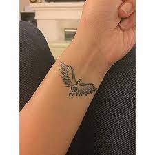 kanatli sol anahtari dovmesi dovmeli kadin parmak dovmeleri omuz dovmesi