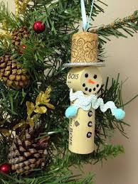 Once it has dried, add more icing to the gum ball and layer the second gum ball on top. Cork Snowman Ornaments Wine Cork Ornaments Cork Crafts Diy Christmas Ornaments