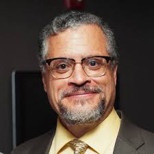 KEVIN DAVID CORLETTE (1960-PRESENT) Kevin Corlette is a mathematician who  specializes in differential and algebraic geometry. He is co-chair of the  science advisory committee of the Mathematical Sciences Research Institute.  Corlette earned