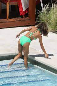 isabela moner sports a green bikini while enjoying a sunny day by the pool  in miami, florida-190719_19