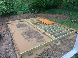 We explain the construction features of floating decks and we include warnings about short or shallow deck posts. Ground Level Deck Drainage Suggestions Home Improvement Stack Exchange