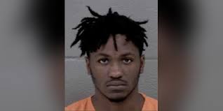 Man accused of robbing, pulling gun