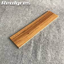 It's the name given to the fossilized remains of terrestrial vegetation. China Petrified Wood Like Wooden Tiles China Wood Tile Rustic Porcelain Tiles