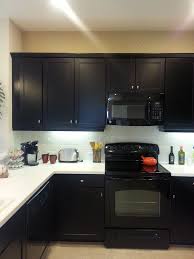 Model Kitchen I Chose The Same Cabinets In Expresso With White Corion Kitchen Cabinets With Black Appliances Black Appliances Kitchen Top Kitchen Cabinets