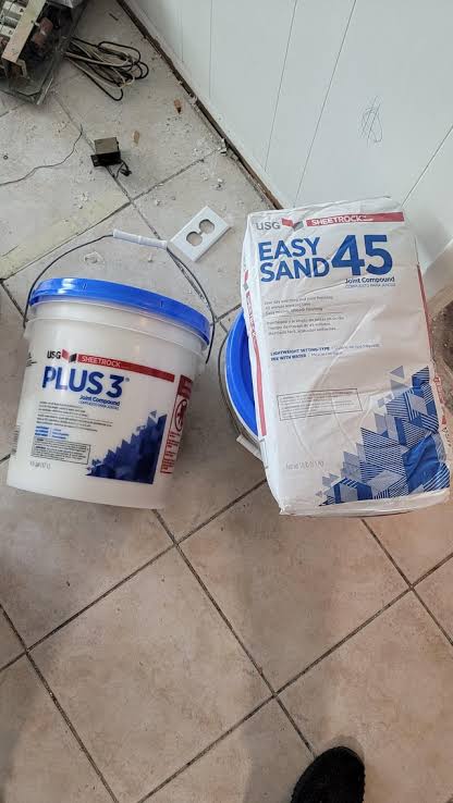 Wall preparation and drywall patching
