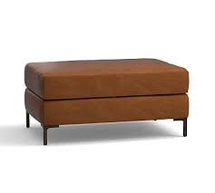 Add a stunning centrepiece to your living room with our designer coffee tables. Jake Leather Ottoman Polyester Wrapped Cushions Vintage Caramel Pottery Barn