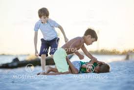 The latest tweets from @18_fitness_boys Young Boys Fighting On Beach By Photobac Mostphotos